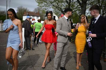 Racegoers attend the second day of the Grand National Festival horse race meeting at Aintree Racecourse in Liverpool, north-west England, on April 12, 2024. (Photo by Oli SCARFF / AFP)