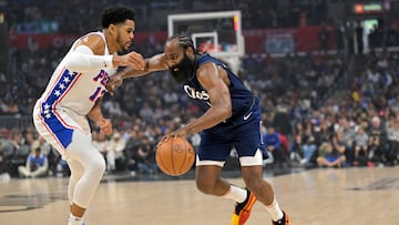 Los Angeles Clippers guard James Harden (1) is defended by Philadelphia 76ers guard Buddy Hield (17) as he drives to the basket in the first half at Crypto.com Arena.