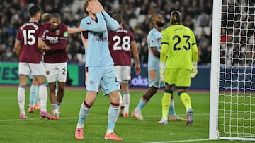 Brentford's Dutch defender #04 Sepp Van den Berg reacts after missing a chance during the English Premier League football match between West Ham United and Brentford at the London Stadium, in London on October 20, 2025. (Photo by Glyn KIRK / AFP) / RESTRICTED TO EDITORIAL USE. No use with unauthorized audio, video, data, fixture lists, club/league logos or 'live' services. Online in-match use limited to 120 images. An additional 40 images may be used in extra time. No video emulation. Social media in-match use limited to 120 images. An additional 40 images may be used in extra time. No use in betting publications, games or single club/league/player publications. /