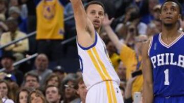 Stephen Curry e Ish Smith.