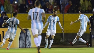 (FILES) This file photo taken on October 10, 2017 shows Argentina's Lionel Messi (2-R) celebrating after scoring against Ecuador during their 2018 World Cup qualifier football match in Quito.
 Argentine Football Association president Claudio Tapia admits that "Manuel the Warlock" deserves part of the credit for Argentina's victory against Ecuador and the team's qualification to the 2018 World Cup.   / AFP PHOTO / Rodrigo BUENDIA