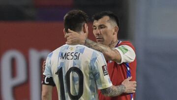 Argentina&#039;s Lionel Messi (L) and Chile&#039;s Gary Medel greet each other after tying 1-1 in their South American qualification football match for the FIFA World Cup Qatar 2022 at the Estadio Unico Madre de Ciudades stadium in Santiago del Estero, Ar