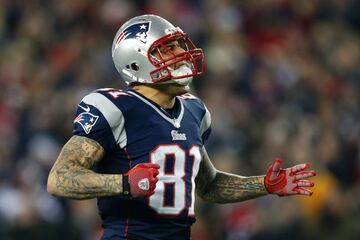 Aaron Hernandez of the New England Patriots reacting after a catch in the third quarter against the Houston Texans during the 2013 AFC Divisional Playoffs game at Gillette Stadium