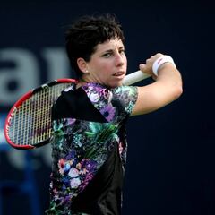 Suárez through in Qatar as Muguruza loses to Petkovic