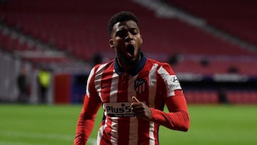 Atletico Madrid&#039;s French midfielder Thomas Lemar celebrates after scoring a goal during the Spanish League football match between Atletico Madrid and Real Valladolid at the Wanda Metropolitano stadium in Madrid on December 5, 2020. (Photo by PIERRE-P