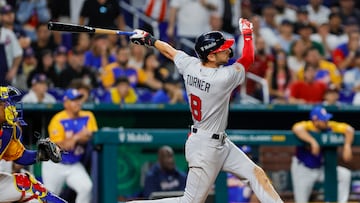 Mar 18, 2023; Miami, Florida, USA; USA shortstop Trea Turner (8) hits a grand slam during the eighth inning against Venezuela at LoanDepot Park. Mandatory Credit: Sam Navarro-USA TODAY Sports