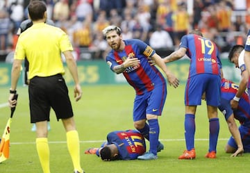 Barcelona's players react to the bottle-throwing incident.