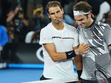 MELBOURNE, AUSTRALIA - JANUARY 29:  Roger Federer of Switzerland (R) celebrates winning in the Men&#039;s Final match against Raphael Nadal of Spain on day 14 of the 2017 Australian Open at Melbourne Park on January 29, 2017 in Melbourne, Australia.  (Photo by Michael Dodge/Getty Images)