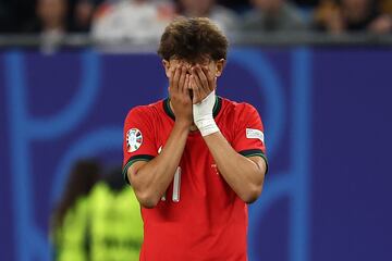 Portugal's forward #11 Joao Felix reacts  during the UEFA Euro 2024 quarter-final football match between Portugal and France at the Volksparkstadion in Hamburg on July 5, 2024. (Photo by FRANCK FIFE / AFP)