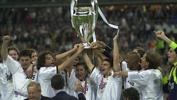 Real Madrid teammates hold the cup after they won the UEFA Champions League soccer final match against Valencia at the Stade de France stadium in Saint-Denis, north of Paris, Wednesday May 24, 2000. Real won 3-0.(AP PHOTO/Denis Doyle)