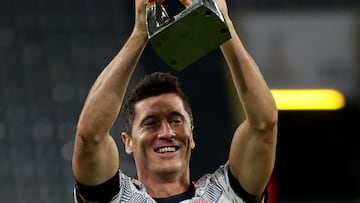 DORTMUND, GERMANY - AUGUST 17: Robert Lewandowski of FC Bayern München lifts the trophy after winning the Supercup 2021 match between FC Bayern München and Borussia Dortmund at Signal Iduna Park on August 17, 2021 in Dortmund, Germany. (Photo by