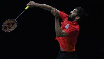 India's Srikanth Kidambi hits a return against Sri Lanka's Niuka Karunaratne during their badminton match at the 2018 Commonwealth Games.