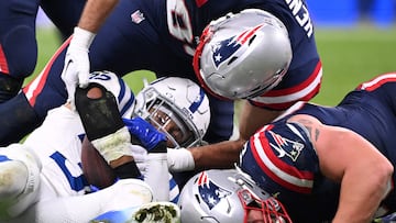 Indianapolis Colts' safety Julian Blackmon (L), New England Patriots' tight end Hunter Henry (C) and New England Patriots' offensive lineman Cole Strange (R) vie during the NFL American football match Indianapolis Colts vs New England Patriots at the Deutsche Bank Park in Frankfurt am Main, western Germany, on November 12, 2023. (Photo by Kirill KUDRYAVTSEV / AFP)