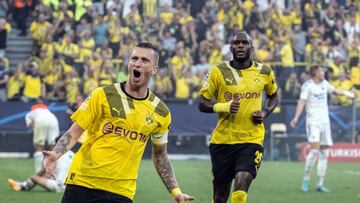 06 September 2022, North Rhine-Westphalia, Dortmund: Soccer: Champions League, Borussia Dortmund - FC Copenhagen, Group stage, Group G, Matchday 1, Signal Iduna Park. Dortmund's Marco Reus (l) celebrates his goal for 1:0 next to Anthony Modeste. Photo: Bernd Thissen/dpa (Photo by Bernd Thissen/picture alliance via Getty Images)