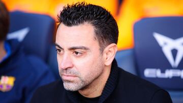 BARCELONA, SPAIN - FEBRUARY 06: Xavi Hernandez, head coach of FC Barcelona looks on during the LaLiga Santander match between FC Barcelona and Club Atletico de Madrid at Camp Nou on February 06, 2022 in Barcelona, Spain. (Photo by Eric Alonso/Getty Images