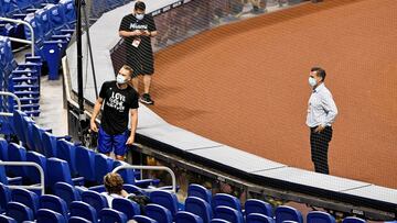 Aug 20, 2020; Miami, Florida, USA; New York Mets general manager Brodie Van Wagenen (R) talks with New York Mets center fielder Brandon Nimmo (L). The game between the Miami Marlins and the New York Mets at Marlins Park has been postponed after a member o