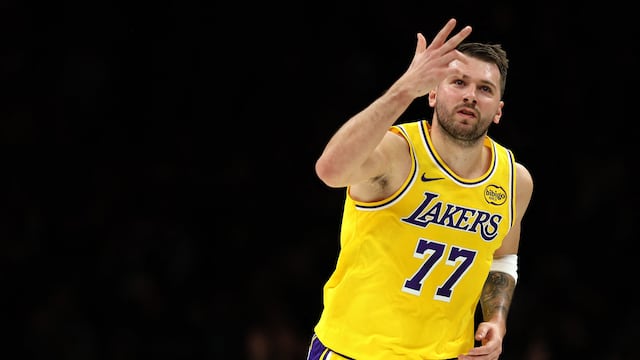 NEW YORK, NEW YORK - FEBRUARY 03: Luka Doncic #77 of the Los Angeles Lakers reacts after shooting a three-point basket during the first quarter against the Brooklyn Nets at Barclays Center on February 03, 2026 in the Brooklyn borough of New York City. NOTE TO USER: User expressly acknowledges and agrees that, by downloading and or using this photograph, user is consenting to the terms and conditions of the Getty Images License Agreement. Ishika Samant/Getty Images/AFP (Photo by Ishika Samant / GETTY IMAGES NORTH AMERICA / Getty Images via AFP)
