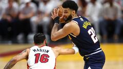 MIAMI, FLORIDA - JUNE 09: Jamal Murray #27 of the Denver Nuggets controls the ball against Caleb Martin #16 of the Miami Heat during the second quarter in Game Four of the 2023 NBA Finals at Kaseya Center on June 09, 2023 in Miami, Florida. NOTE TO USER: User expressly acknowledges and agrees that, by downloading and or using this photograph, User is consenting to the terms and conditions of the Getty Images License Agreement.   Mike Ehrmann/Getty Images/AFP (Photo by Mike Ehrmann / GETTY IMAGES NORTH AMERICA / Getty Images via AFP)