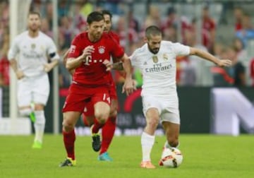 Xabi Alonso e Isco.