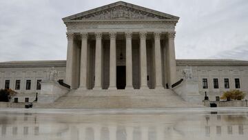 The US Supreme Court building is reflected on wet marble as rulings are expected in Washington, U.S. November 22, 2021.