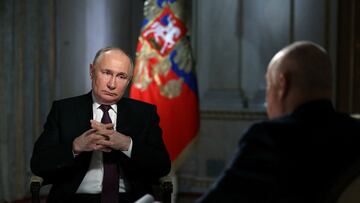 Russian President Vladimir Putin speaks with Director General of Rossiya Segodnya media group Dmitry Kiselyov during an interview in Moscow, Russia, March 12, 2024. Sputnik/Gavriil Grigorov/Pool via REUTERS ATTENTION EDITORS - THIS IMAGE WAS PROVIDED BY A THIRD PARTY.