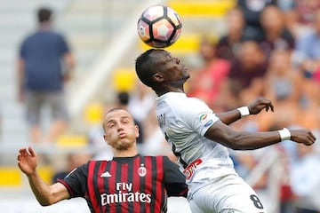 Antonelli challenges Udinese's Emmanuel Agyeman earlier in the match