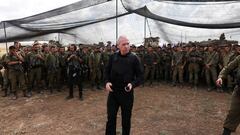 Israel's Defence Minister Yoav Gallant meets soldiers in a field near Israel's border with the Gaza Strip, in southern Israel October 19, 2023. REUTERS/Ronen Zvulun