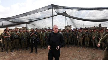 Israel's Defence Minister Yoav Gallant meets soldiers in a field near Israel's border with the Gaza Strip, in southern Israel October 19, 2023. REUTERS/Ronen Zvulun