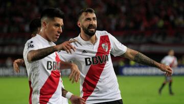 Soccer Football - Copa Libertadores - Colombia's Santa Fe v Argentina's River Plate - Nemesio Camacho El Campin stadium, Bogota, Colombia - May 3, 2018. Lucas Pratto (R) of River Plate celebrates with teammate after scoring his goal. REUTERS/Jaime Saldarriaga