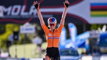 Netherlands&#039; Anna van der Breggen celebrates as she crosses the finish line to win the Women&#039;s Elite Road Race, a 143-kilometer route around Imola, Emilia-Romagna, Italy, on September 26, 2020 as part of the UCI 2020 Road World Championships. (Photo by Marco BERTORELLO / AFP)