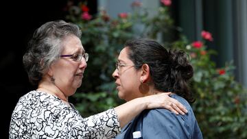 Women react outside the Ssgt Willie de Leon Civic Center, where students had been transported from Robb Elementary School after a suspected shooting, in Uvalde, Texas, U.S. May 24, 2022.  REUTERS/Marco Bello