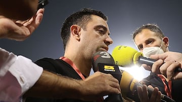 Qatari football club al-Sadd SC's Spanish coach Xavi Hernandez is interviewed by journalists following his team's Qatar Stars League match against al-Duhail SC, at Thani Bin Jassim Stadium (Al-Gharafah Stadium) in Qatar's capital Doha on No