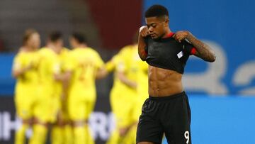 Leverkusen's Jamaican midfielder Leon Bailey reacts during the German first division Bundesliga football match between Bayer 04 Leverkusen and FC Freiburg in Leverkusen, western Germany, on February 28, 2021. (Photo by THILO SCHMUELGEN / POOL / AFP)