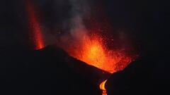 The Cumbre Vieja volcano spews lava and smoke as it continues to erupt on the Canary Island of La Palma, as seen from Tacande, Spain, October 12, 2021. REUTERS/Sergio Perez