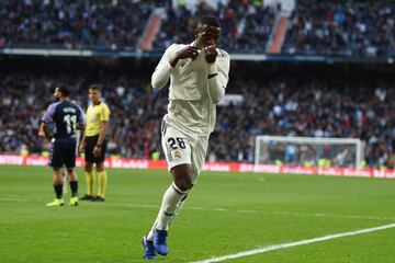 Vinicius Junior celebrates after his shot took a deflection off Kike to put Madrid ahead against Valladolid. Min.82