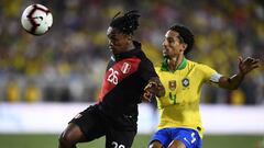 Sep 10, 2019; Los Angeles, CA, USA; Peru forward Yordy Reyna (26) and Brazil defender Marquinhos (4) battle for the ball during the the second half of the South American Showdown soccer match at Los Angeles Coliseum. Mandatory Credit: Kelvin Kuo-USA TODAY