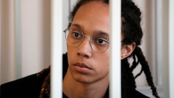 FILE PHOTO: WNBA star and two-time Olympic gold medalist Brittney Griner sits in a cage at a court room prior to a hearing, in Khimki , outside Moscow, Russia, July 27, 2022. American basketball star Brittney Griner returns to a Russian courtroom for her drawn-out trial on drug charges that could bring her 10 years in prison of convicted. Alexander Zemlianichenko/Pool via REUTERS/File Photo