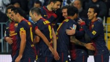 El Barcelona festejando un gol frente al Málaga en la Rosaleda