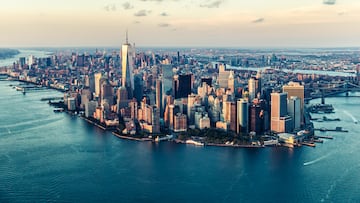 Image of the Manhattan skyline at sunset from an elevated angle.