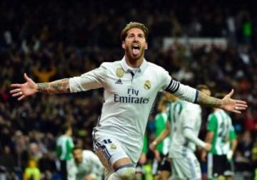 Real Madrid's defender Sergio Ramos celebrates after scoring a goal during the Spanish league footbal match Real Madrid CF vs Real Betis at the Santiago Bernabeu stadium in Madrid on March 12, 2017. / AFP PHOTO / GERARD JULIEN