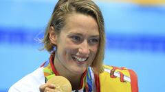 Phelps augments legend status; Simone Manuel makes history