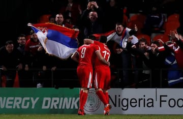 Serbia's Aleksandar Mitrovic celebrates scoring their second goal with team mates.