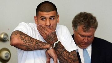 New England Patriots tight end Aaron Hernandez is arraigned on charges of murder and weapons violations in Attleborough, Massachusetts
