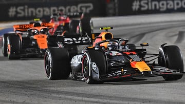 Red Bull Racing's Mexican driver Sergio Perez drives during the Singapore Formula One Grand Prix night race at the Marina Bay Street Circuit in Singapore on September 17, 2023. (Photo by Lillian SUWANRUMPHA / AFP)