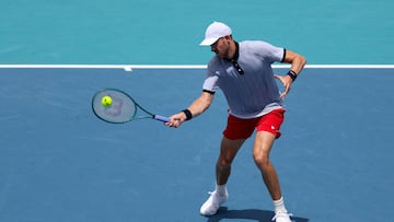 MIAMI GARDENS, FLORIDA - MARCH 26: Nicolas Jarry of Chile returns a shot to Casper Ruud of Norway