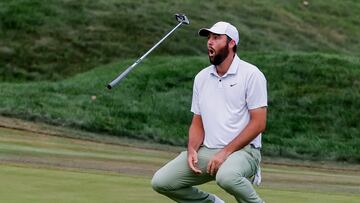 Scottie Scheffler of the US reacts after missing a putt on the 18th hole during the final round of The Players Championship golf tournament in Ponte Vedra Beach, Florida.