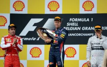 Los tres del podio. Fernando Alonso, Vettel y Hamilton.
