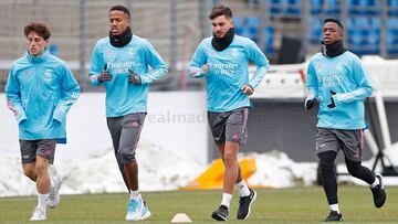 Odriozola, Militao, Chust y Vinicius, en el entrenamiento del Real Madrid.