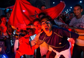 Locals celebrate in Marrakech after Morocco's victory over Ivory Coast in their FIFA 2018 World Cup Play-Off.