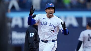 Jun 27, 2024; Toronto, Ontario, CAN; Toronto Blue Jays right fielder George Springer (4) reacts as he runs the bases on his three-run home run against the New York Yankees during the first inning at Rogers Centre. Mandatory Credit: John E. Sokolowski-USA TODAY Sports